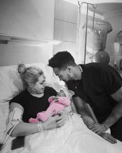 Ashley Banjo and wife with their baby daughter