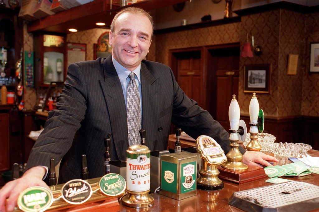 Editorial use only. Exclusive - Premium Rates Apply. Call your Account Manager for pricing. Mandatory Credit: Photo by ITV/REX/Shutterstock (802717kz) 'Coronation Street' TV - 2001 - Duggie Ferguson (John Bowe) takes over as sole owners of the Rovers. ITV ARCHIVE