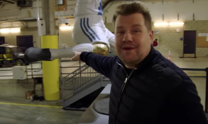 James with the statue