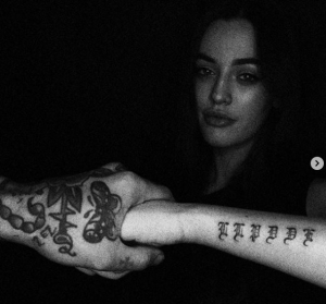 The tattoo of their initials