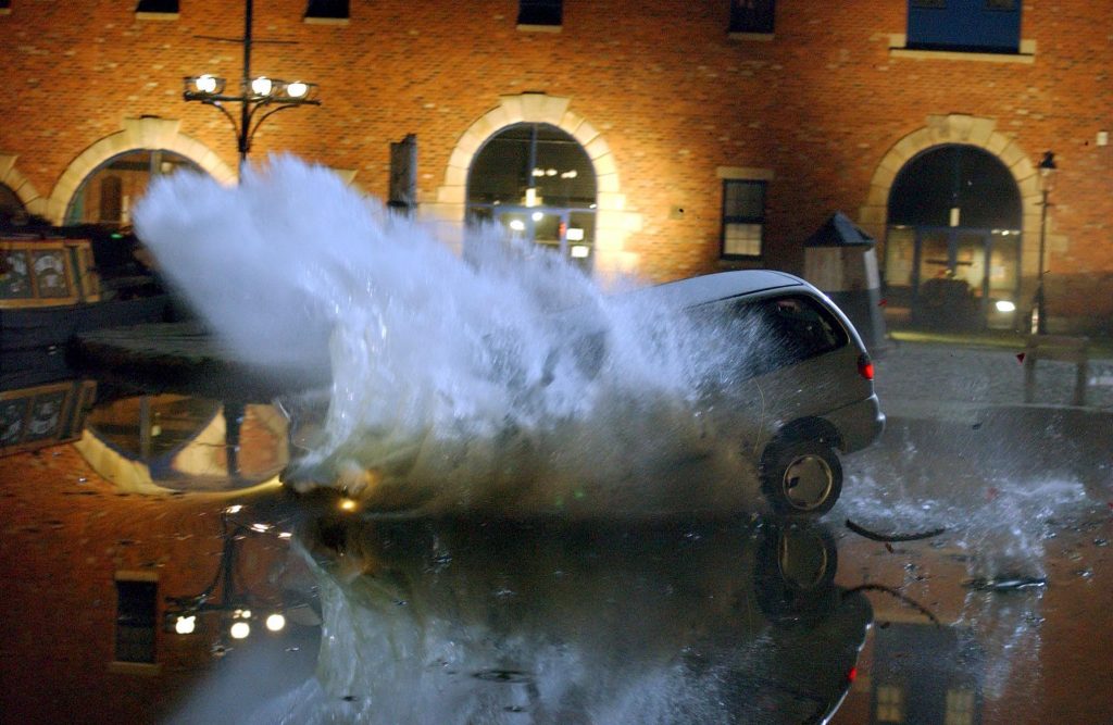Editorial use only. Exclusive - Premium Rates Apply. Call your Account Manager for pricing. Mandatory Credit: Photo by ITV/REX/Shutterstock (697529ay) 'Coronation Street' TV - 2003 - Richard Hillman (Brian Capron) drives the car into the Canal. ITV ARCHIVE