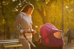 Woman with pushchair