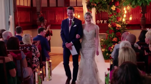 Steph and Jonathan walk up the aisle