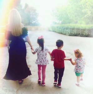 Christine with their kids