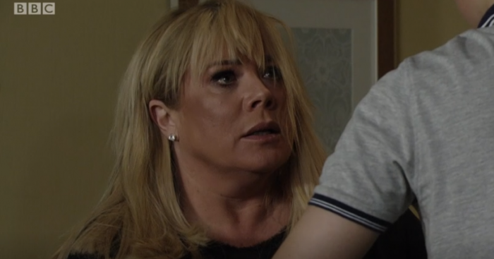 EastEnders Sharon punched by Denny Credit: BBC