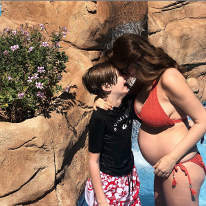 Stacey Solomon and son inn the sun