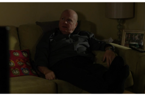 Phil waiting for Sharon's bombshell