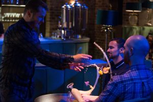 Ben antagonises two men and gets beaten up (Credit: BBC)