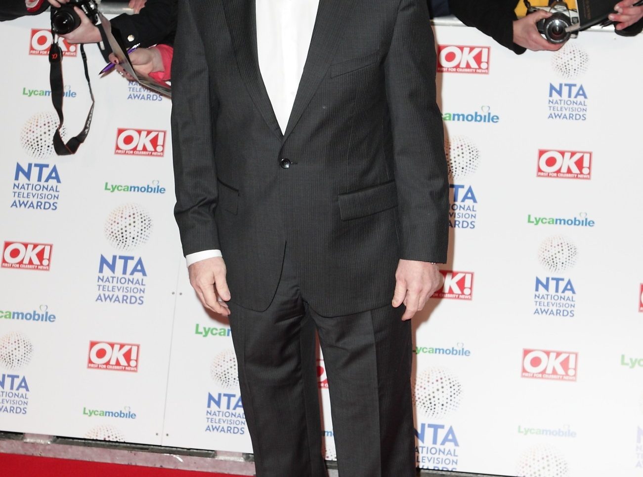 Celebrities seen arriving on the red carpet at the 2014 National Television Awards, held at the O2 Arena in London. WORLDWIDE RIGHTS Pictured: Steve McFadden Ref: SPL4078146 230114 NON-EXCLUSIVE Picture by: Grant Buchanan / FameFlynet.uk.com / SplashNews.com Splash News and Pictures Los Angeles: 310-821-2666 New York: 212-619-2666 London: 0207 644 7656 Milan: +39 02 56567623 photodesk@splashnews.com World Rights