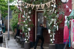 Phil and Keanu try to get into the Vic to check everyone is safe EastEnders