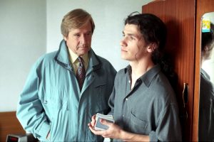 Editorial use only. Exclusive - Premium Rates Apply. Call your Account Manager for pricing. Mandatory Credit: Photo by ITV/Shutterstock (669486oz) 'Coronation Street' TV - 1993 - Ken Barlow [William Roache] calls at Tracy's flat and meets her boyfriend Craig Lee [Kieran O'Brien]. ITV ARCHIVE