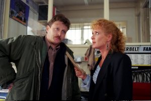 Editorial use only. Exclusive - Premium Rates Apply. Call your Account Manager for pricing. Mandatory Credit: Photo by ITV/Shutterstock (669486pf) Coronation Street: TV - 1993 Liz McDonald [Beverley Callard] is horrified to receive Jim McDonald's [Charles Lawson] divorce petition. She is not happy that he has accused her of unreasonable behaviour. ITV ARCHIVE