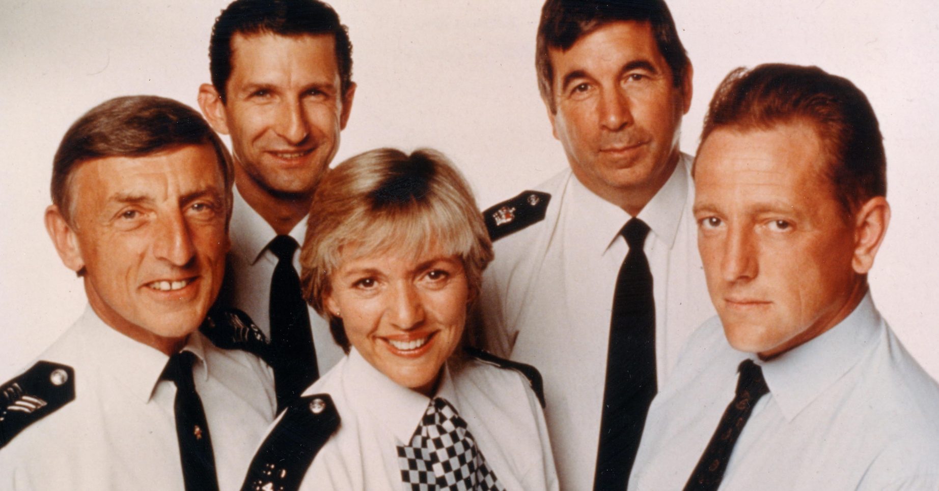 Group shot of The Bill cast originals