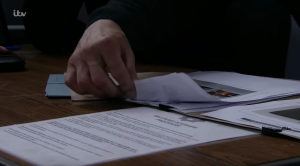 The police ask Kel if the polaroids found in his home belong to him Coronation Street