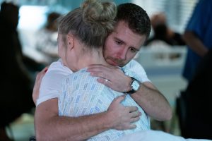 Lee looks upset as he hugs Linda in EastEnders