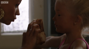 Lola put fake tan on Lexi (Credit: BBC iPlayer)