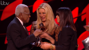 Tess Daly and Claudia Winkleman with Trevor McDonald 