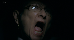 Corrie Yasmeen locked in a box