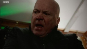 Ben points gun at Phil