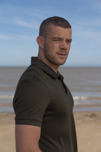 Russell Tovey stars as personal trainer Jake in the series (Credit: ITV)