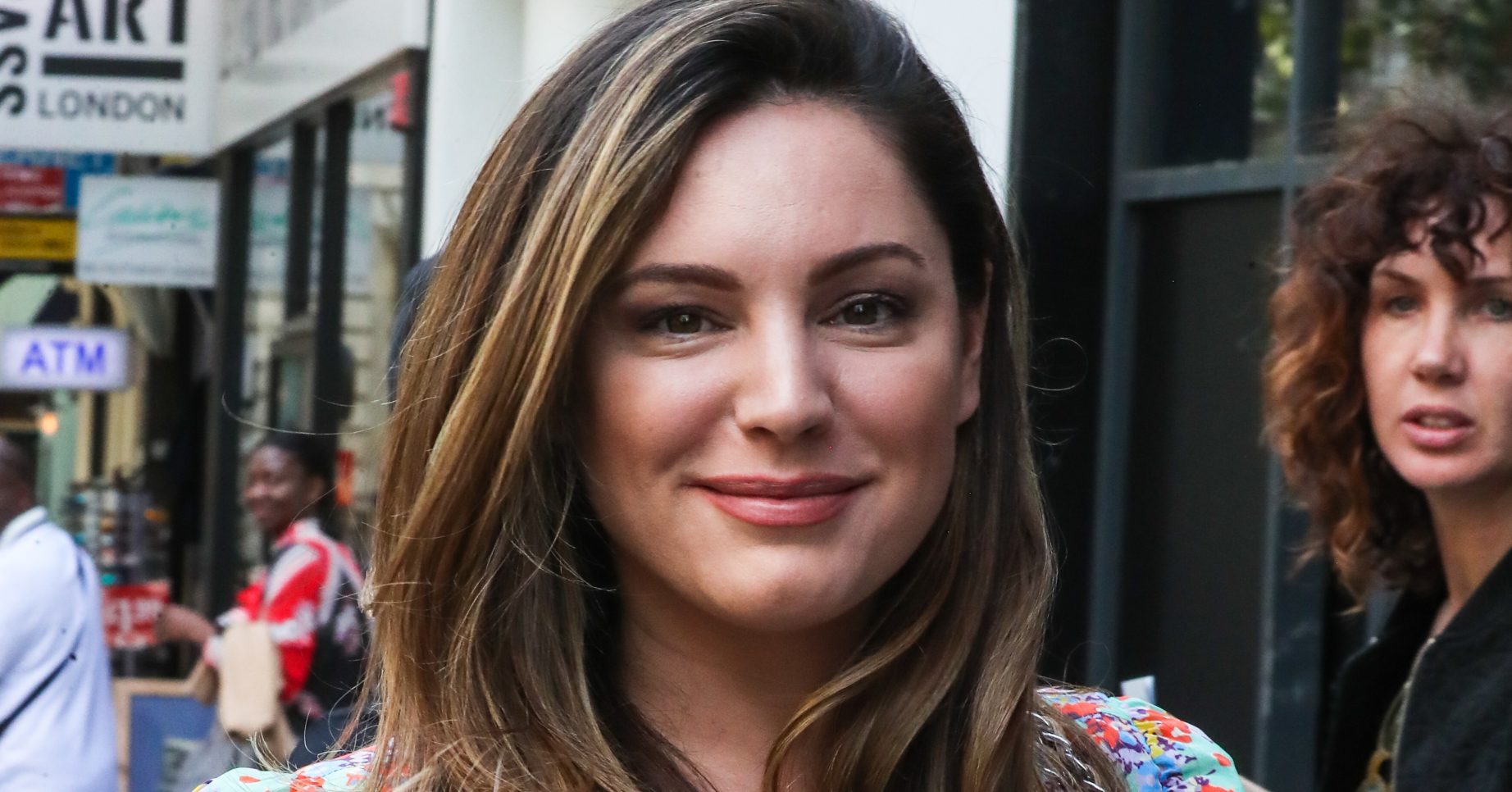 Kelly Brook smiling for the camera in close-up