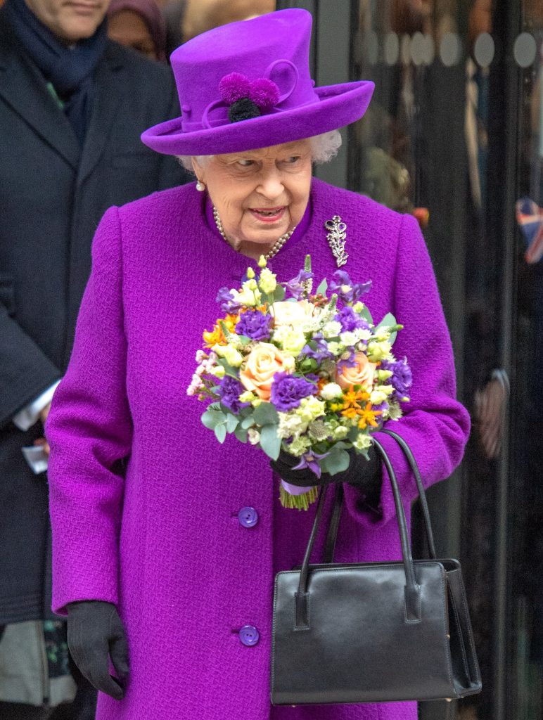 The Queen wears gloves for first time at investiture Entertainment Daily