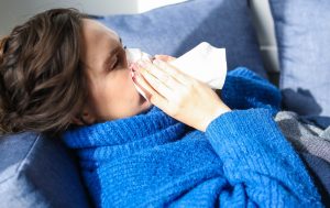 Cold and flu coronavirus woman tissues