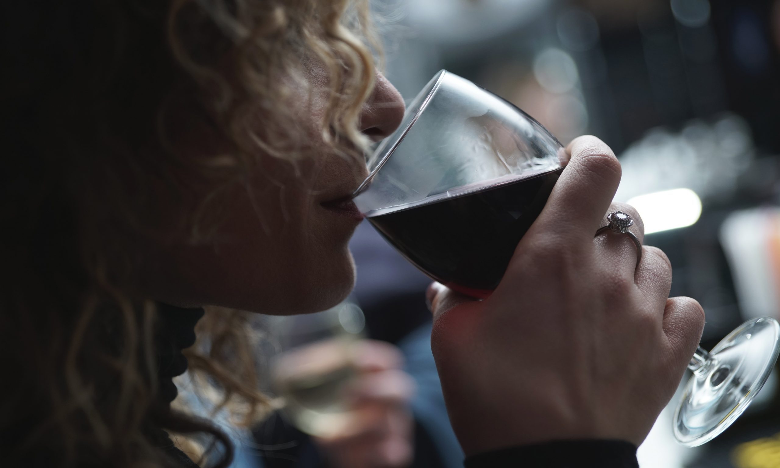 alcohol ban woman drinking wine