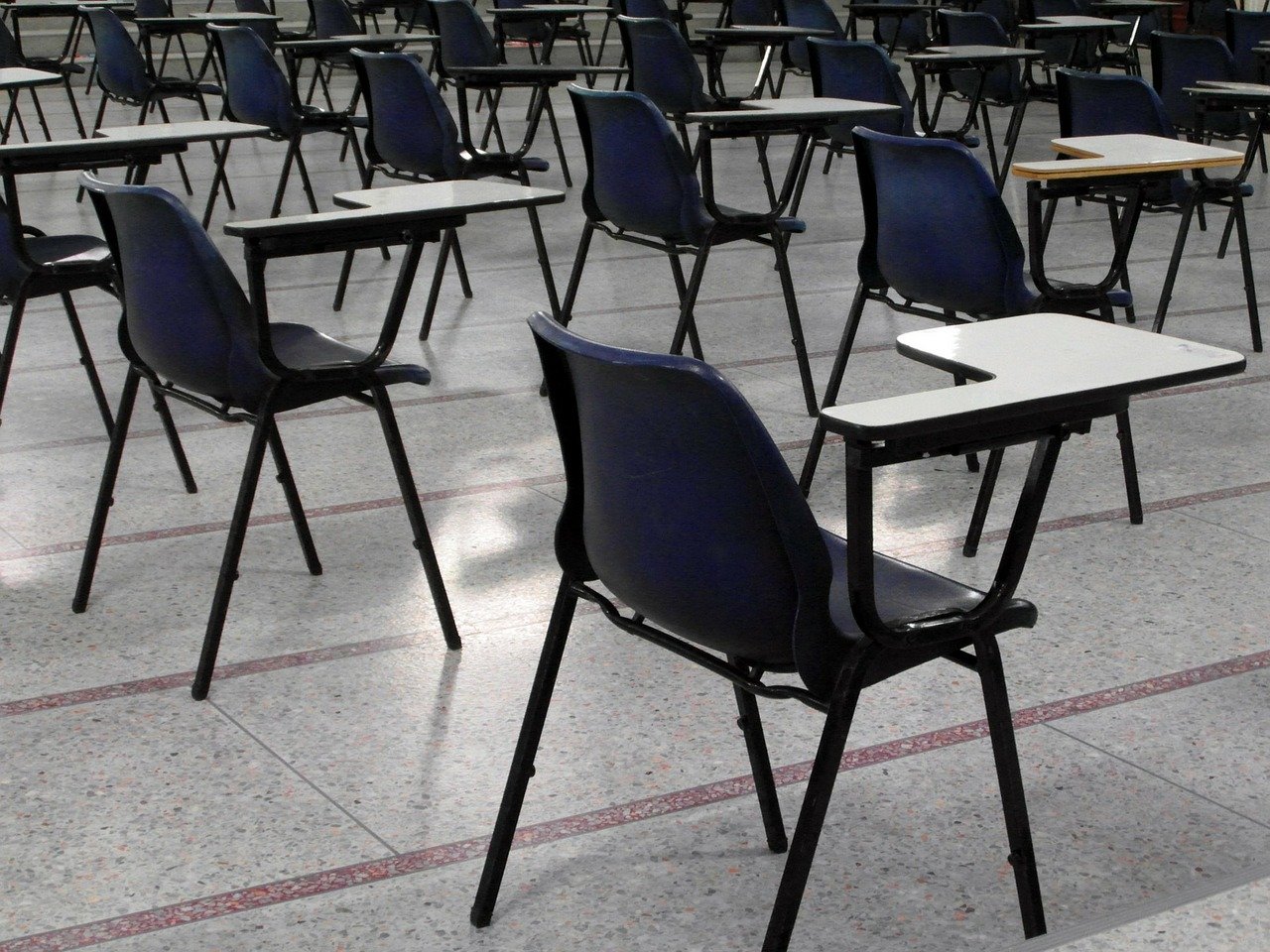 Empty school chairs. Schools to re-open after Easter if UK coronavirus lockdown continues to work, say ministers
