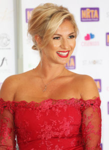 Cici Coleman at a red carpet event. She is in First Dates at Christmas