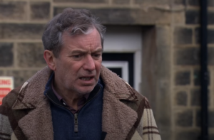 Ashley looks confused in Emmerdale