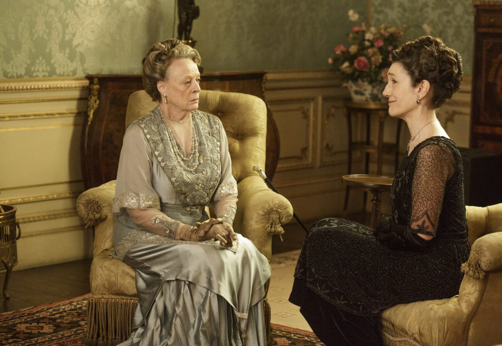 Downton Abbey | Series Six We return to the sumptuous setting of Downton Abbey for the sixth and final season of this internationally acclaimed hit drama series. As our time with the Crawleys begins to draw to a close, we see what will finally become of them all. The family and the servants, who work for them, remain inseparably interlinked as they face new challenges and begin forging different paths in a rapidly changing world. Photographer: Nick Briggs MAGGIE SMITH as Violet, Dowager Countess of Grantham & HARRIET WALTER as Lady Shackleton