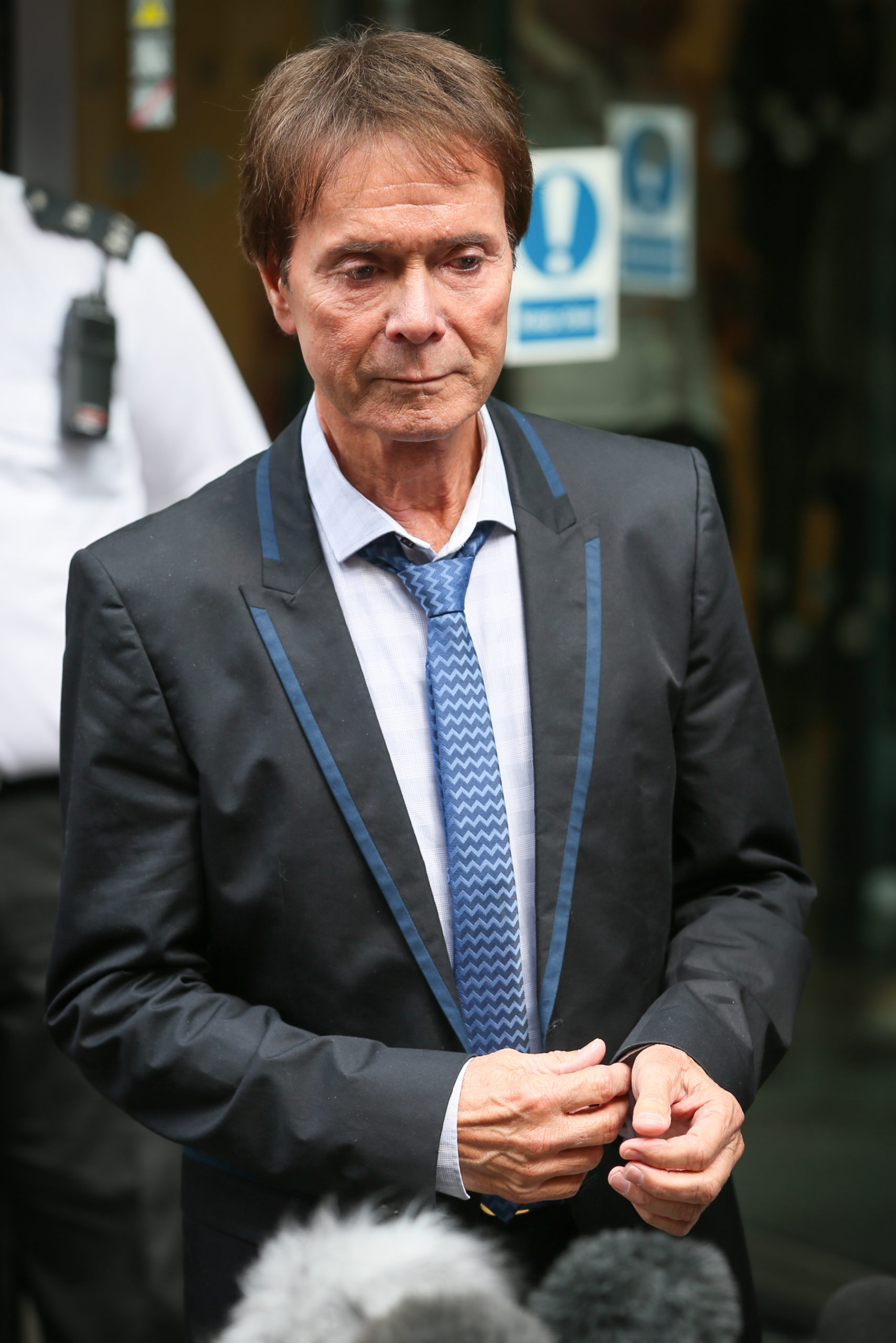Cliff Richard looks emotional after winning court case against the BBC