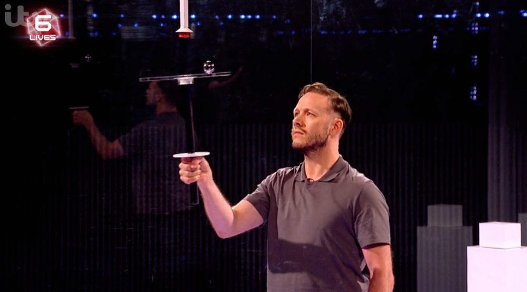 Kevin Clifton doing a challenge on The Million Pound Cube