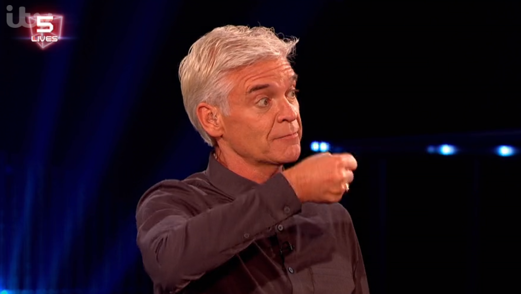 Phillip Schofield gesturing with his hand on The Million Pound Cube