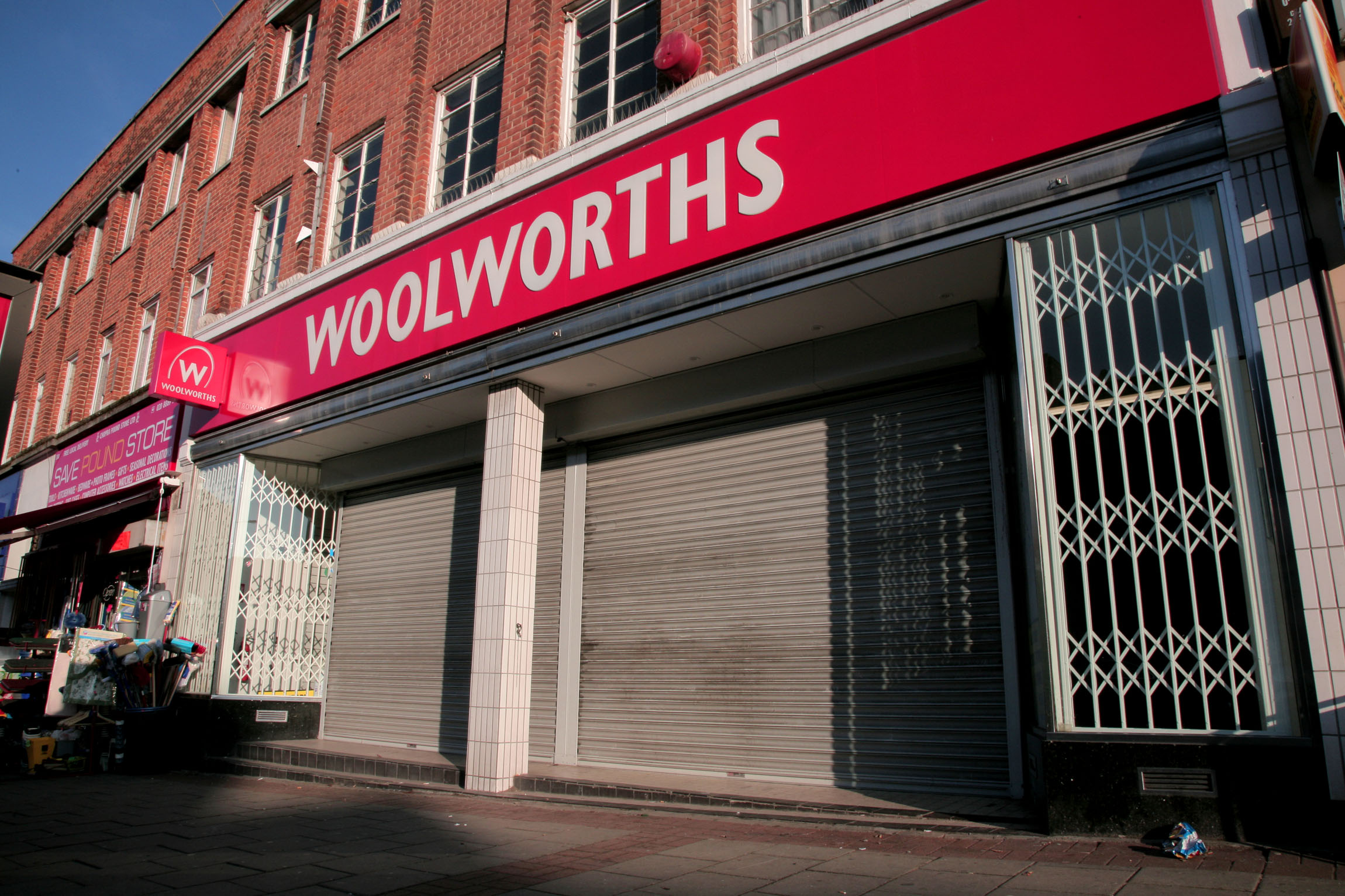 Woolworths store that has closed down with shutters