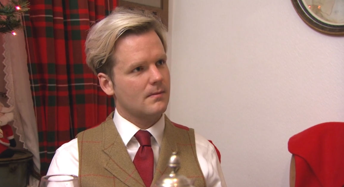 Bruce at a dinner table on Come Dine With me