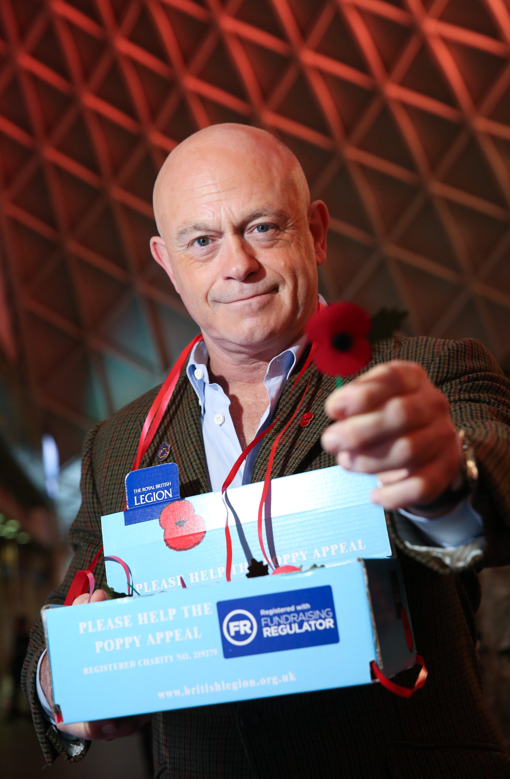 Ross Kemp holding a poppy for Poppy Appeal day