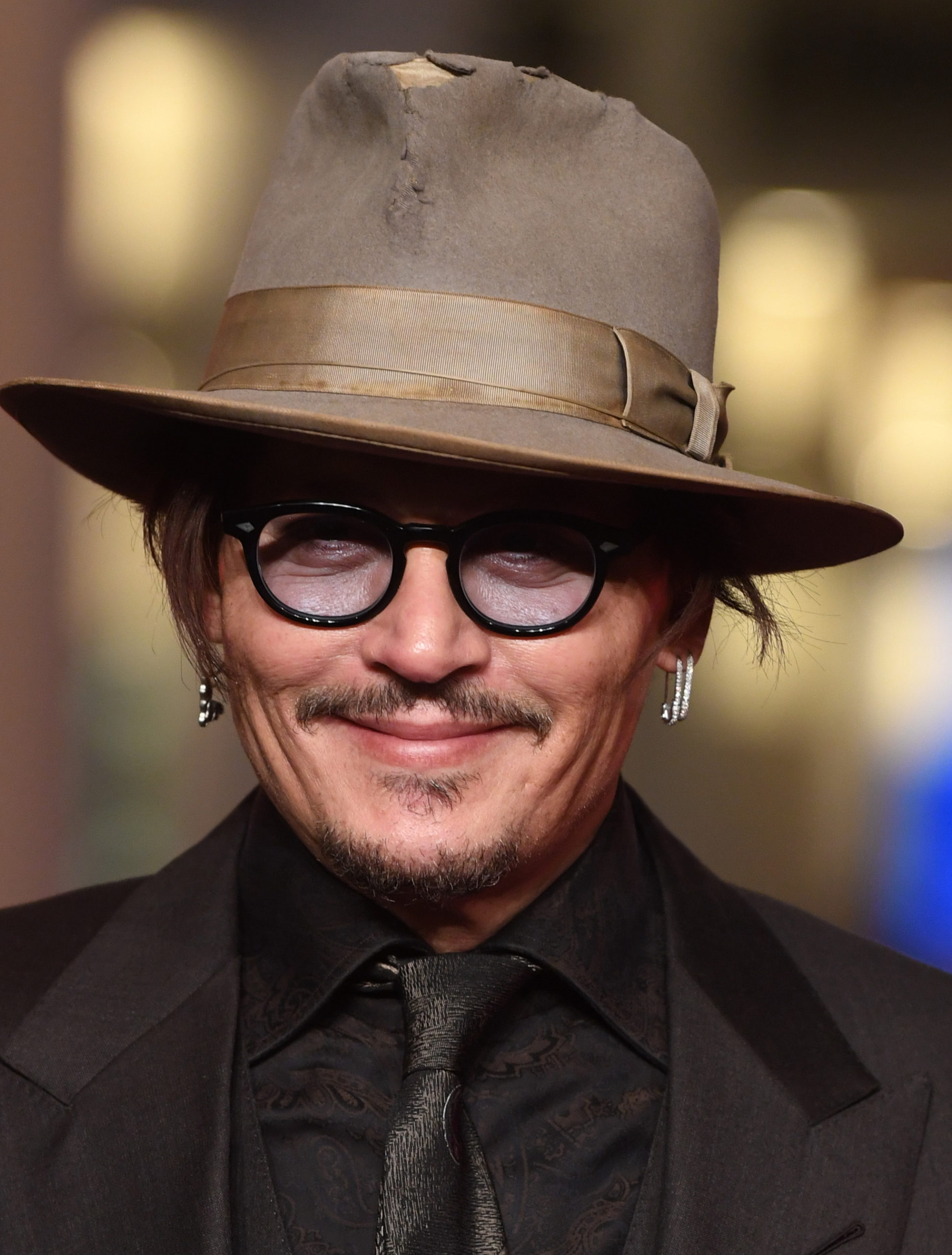 Johnny Depp wears fedora-style hat