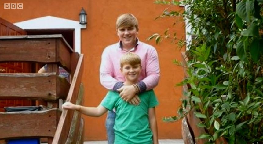 Ed with his arms around Harvey, picture on Countryfile