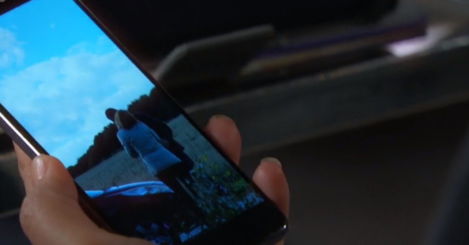 Someone took a photo of Charity and Mackenzie kissing in Emmerdale 