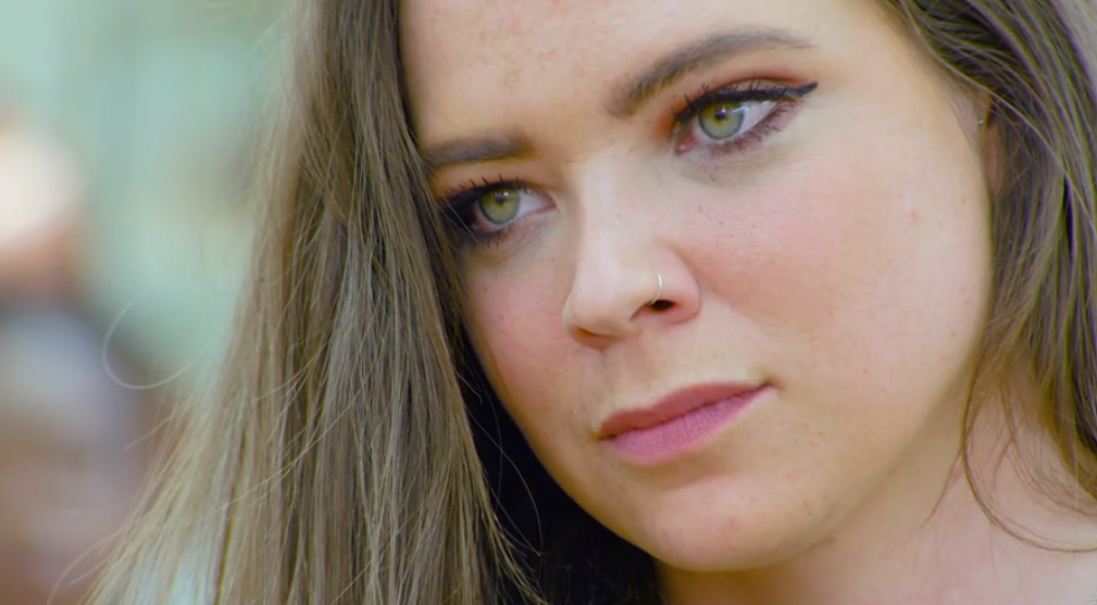 Lottie looking worried on Great British Bake Off