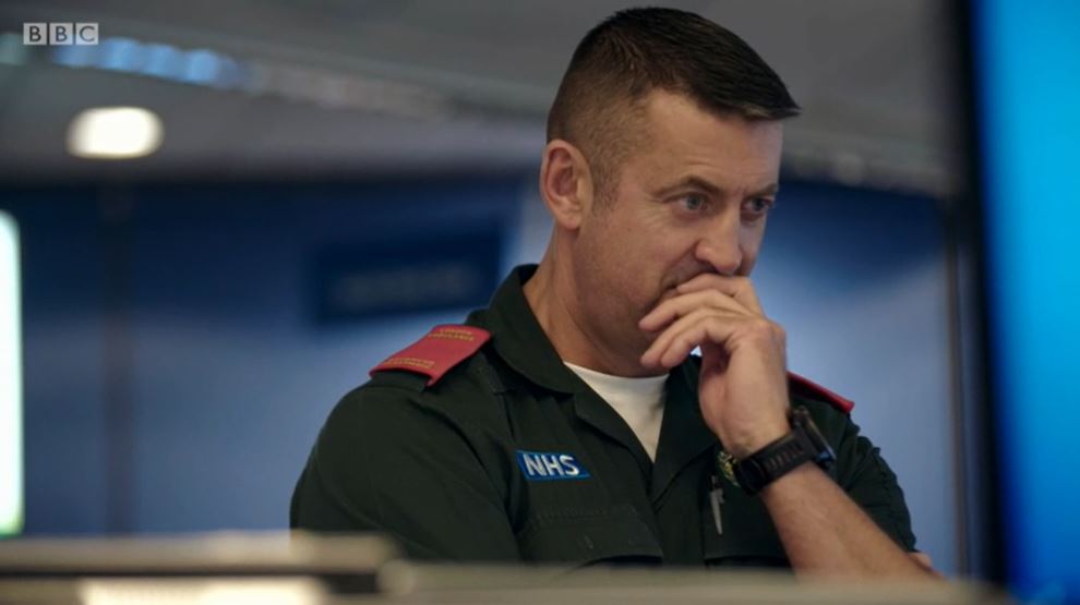 999 call handler covering his mouth on Ambulance