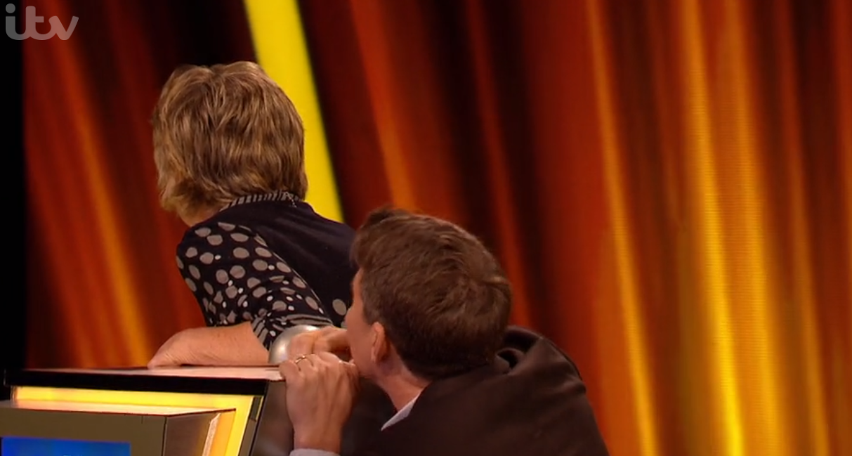 Tipping Point host Ben Shephard falling to his knees