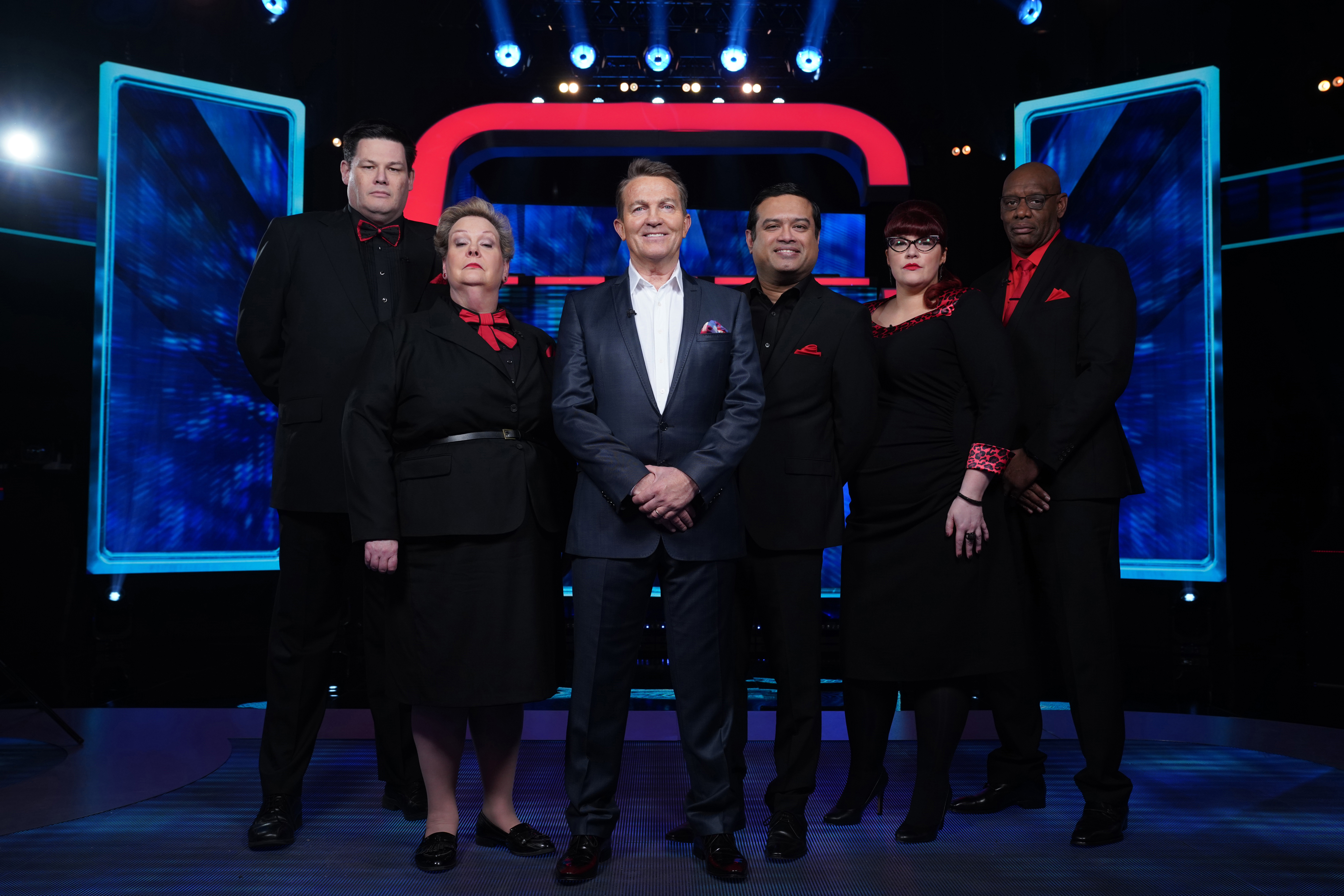 Bradley Walsh and the chasers on beat the chasers, which is back for a new series