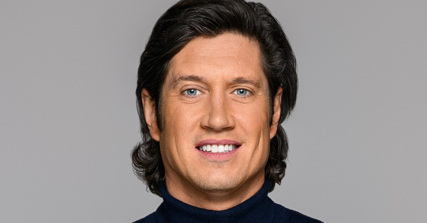 Vernon Kay smiling against a grey background