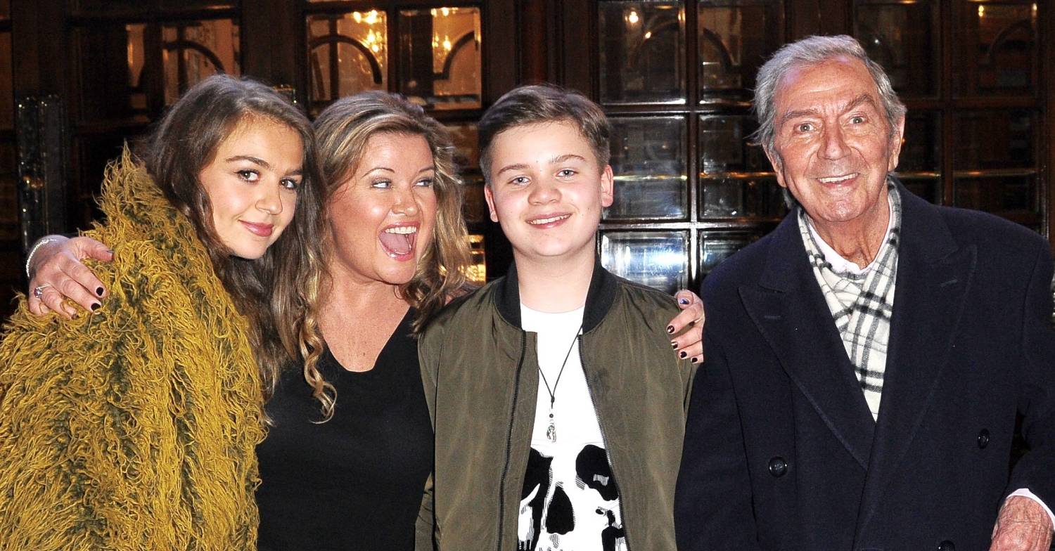 Des O'Connor steps out with his family