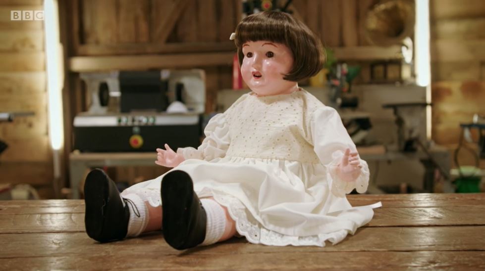 Alice the doll after being fixed up on The Repair Shop