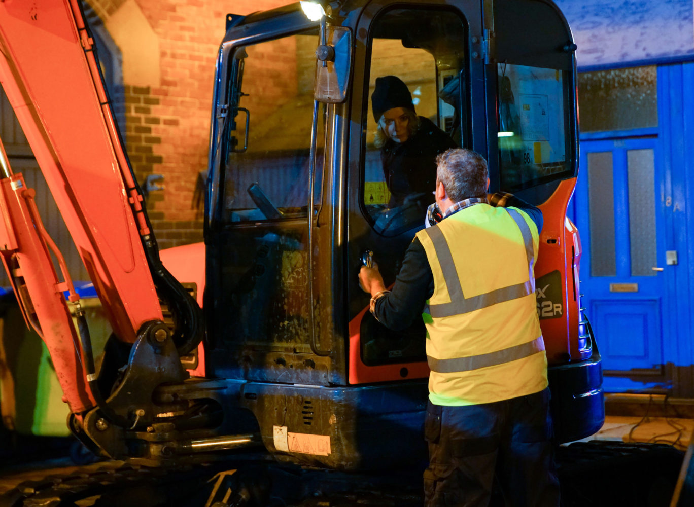 Abi jumps in the cab of the digger in Coronation Street 