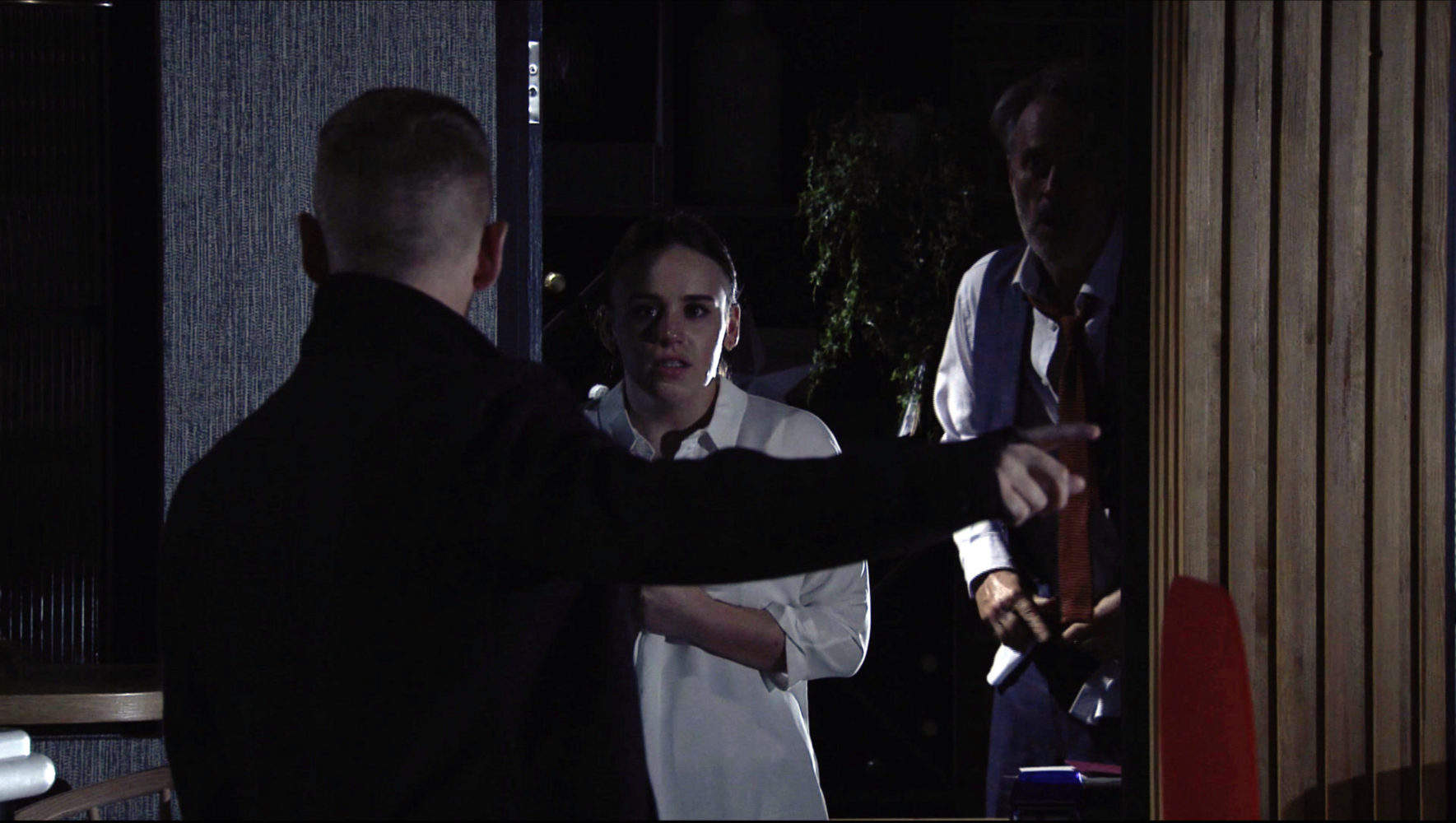 Gary hears Faye's muffled cries coming from Ray's office